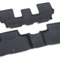A pair of black rubber car floor mats shown on a plain white background, with one set positioned above the other to display both pieces.